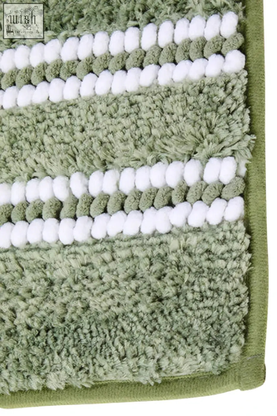 A plush sage green bath mat with soft terry cloth and white braided stripes perfect for a green bath space