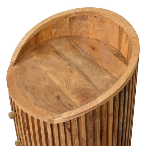 A rustic solid mango wood bedside table with vertical slats and natural wood grain finish in oak tone