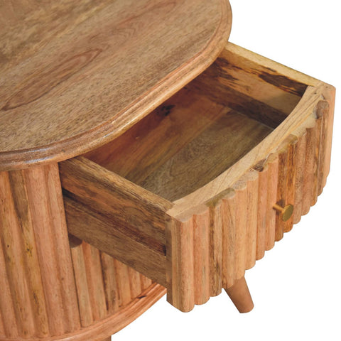 A rustic soba nordic bedside table with curved top and mango wood drawer showing natural oak interior