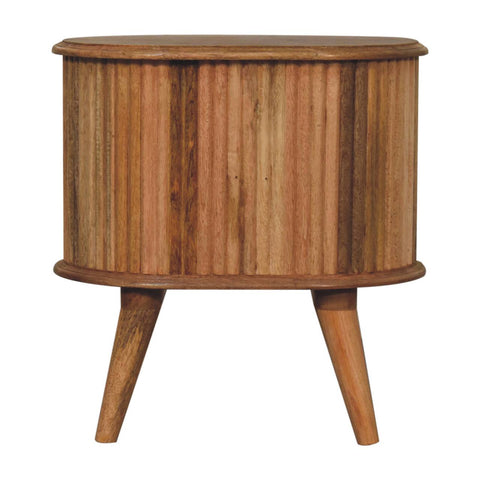 Soba nordic bedside table with a rustic fluted oval body and tapered legs made from oak mango wood