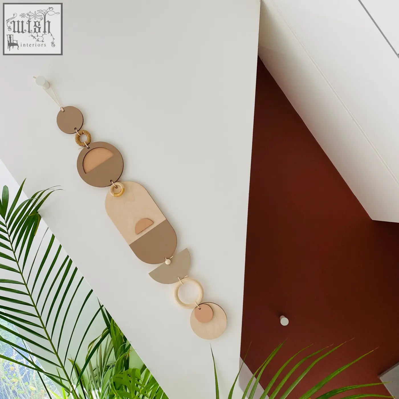 Soft pink modern wall art with layered geometric shapes in natural wood for stylish neutral home decor and modern wall use
