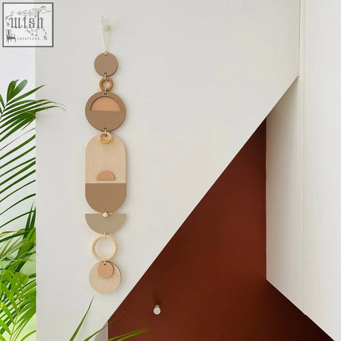Minimalist modern wall art with layered geometric shapes in soft beige and tan tones for neutral home decor