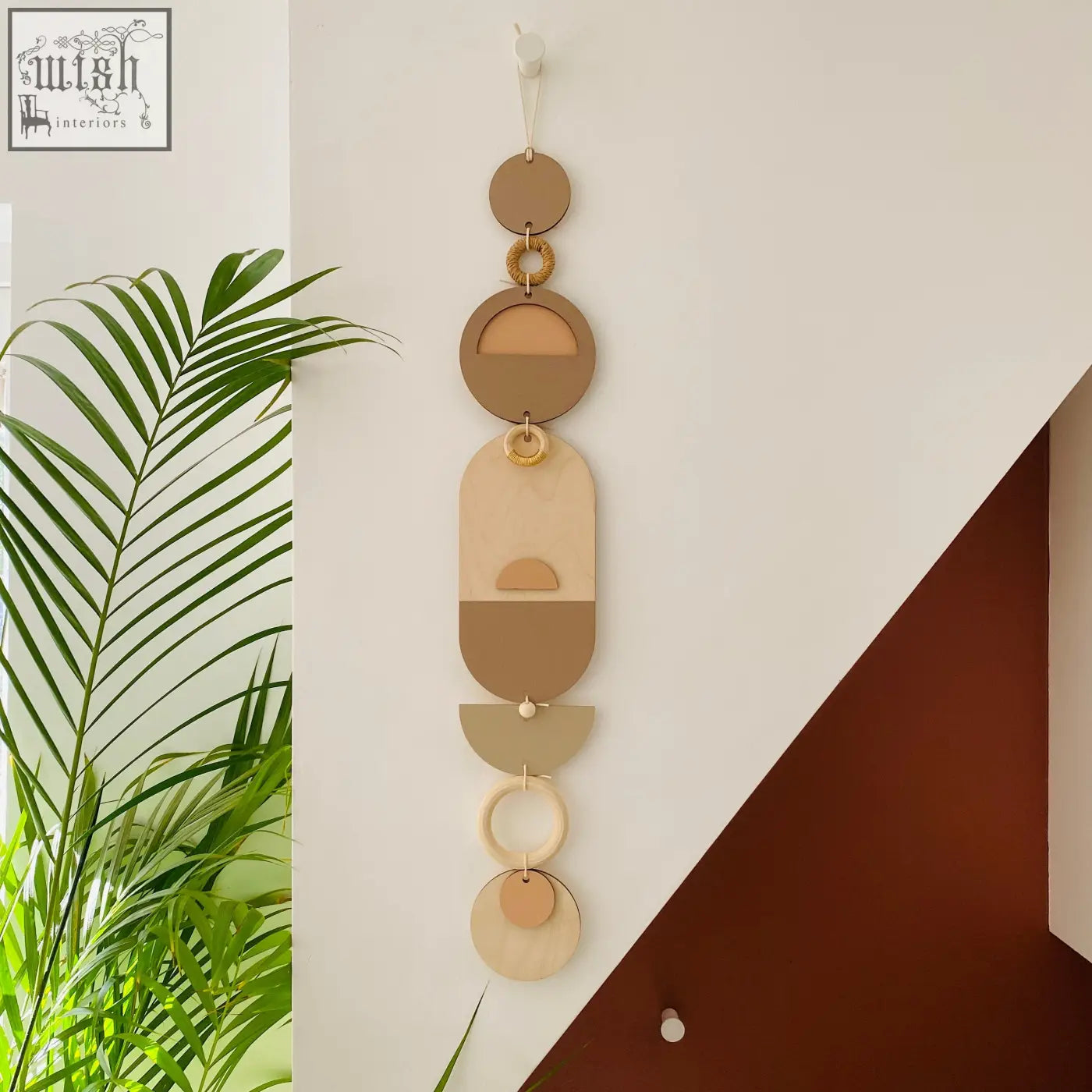 Soft pink modern wall art featuring minimal geometric shapes in natural wood finish for neutral home decor