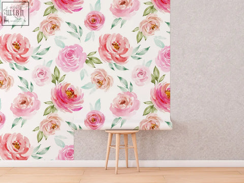 Soft pink roses watercolor peel and stick wallpaper rolled up on wooden stool perfect for living space contact clickwalls