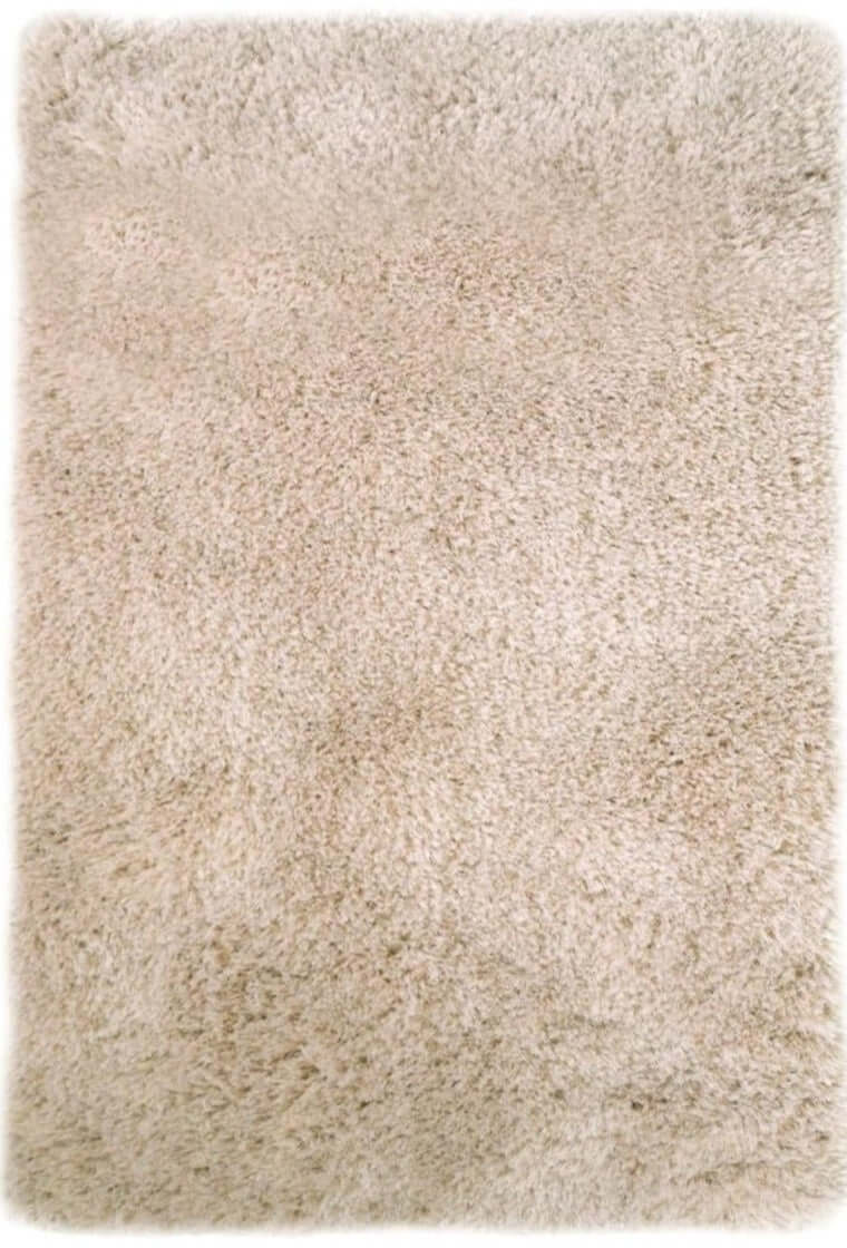 Soft washable beige shaggy rug with a plush texture perfect for cozy living spaces and easy cleaning