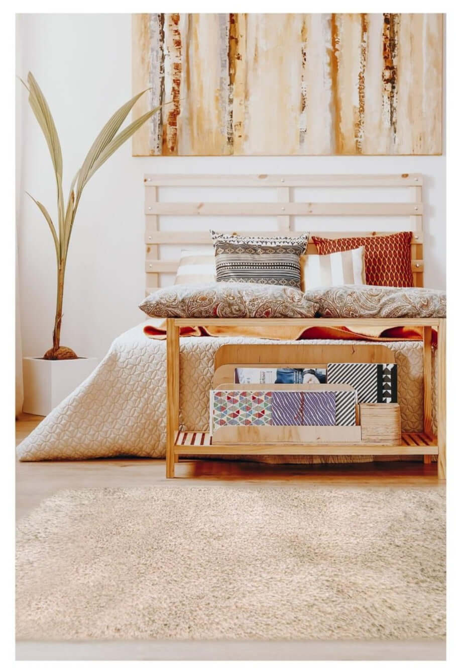 Soft washable beige shaggy rug on light wood pallet bed frame with rustic design and open storage shelf beneath