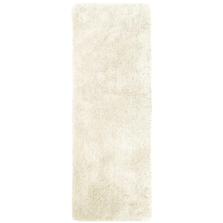 Cream-colored soft washable ivory shaggy rug with plush fluffy texture perfect for cozy spaces