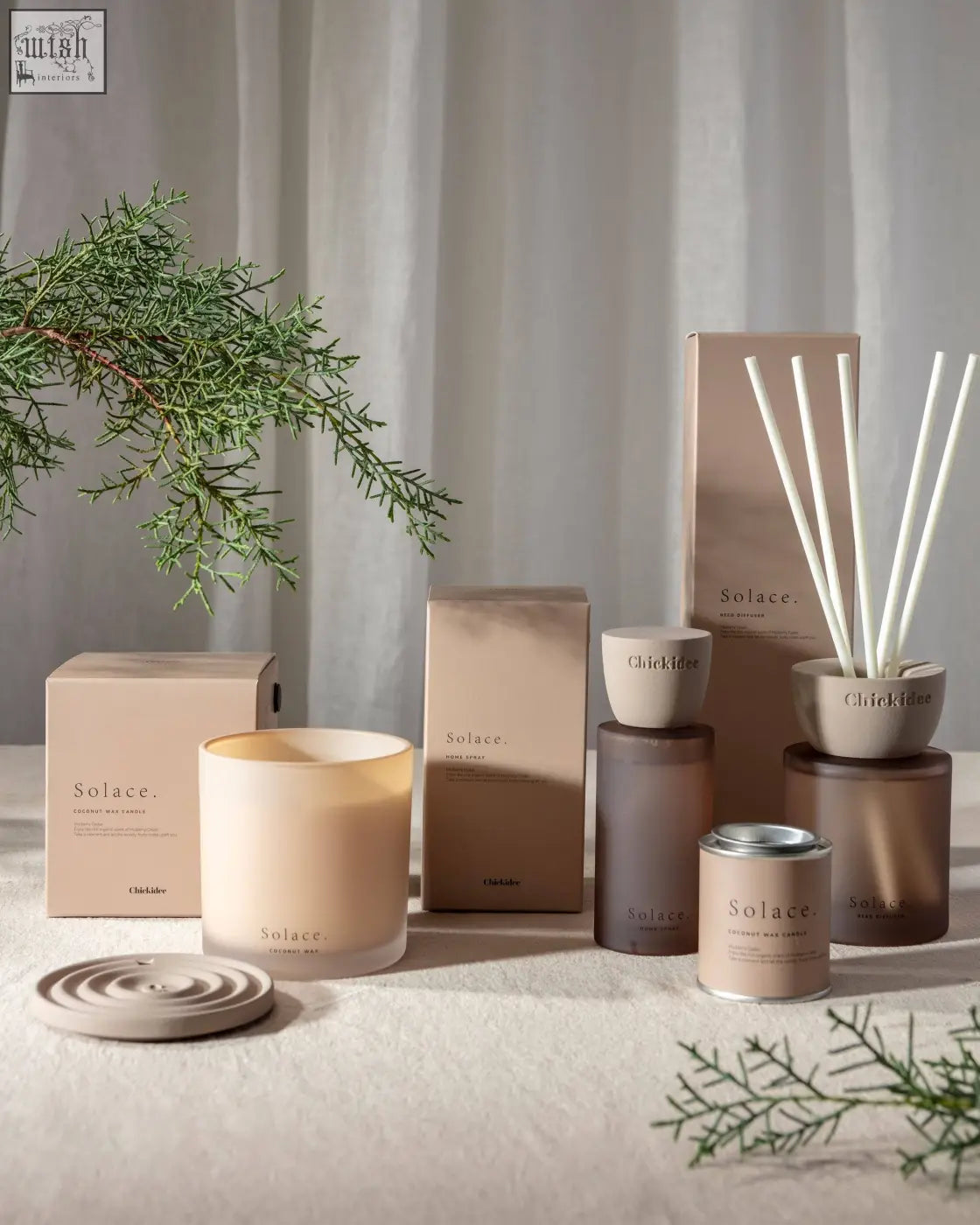 Beige frosted glass candle with minimalist design and solace branding for solace clay home spray use
