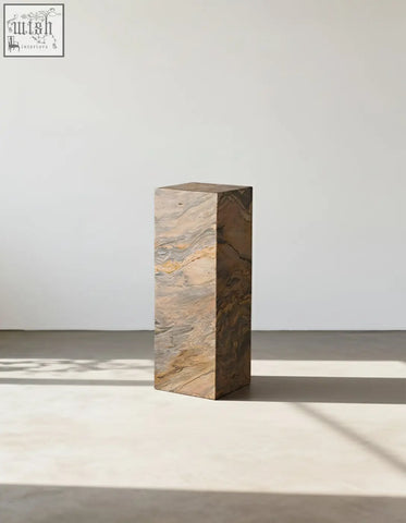 Solara plinth side table made of polished brazilian quartzite stone with natural brown and beige marble pattern
