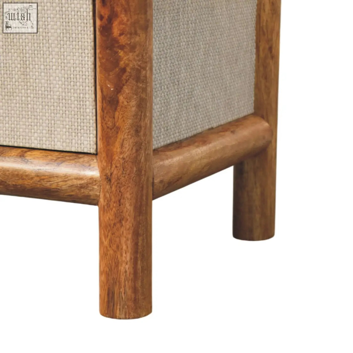 Solara rattan bedside table with warm polished wood frame and light beige woven fabric panels in mid-century style