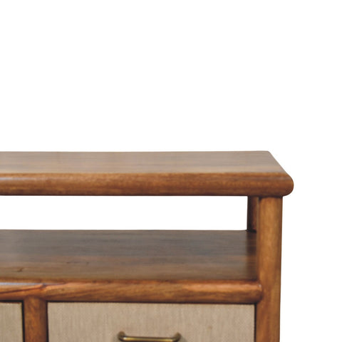 Warm-toned wooden solara rattan coffee table with smooth polished finish and rounded edges