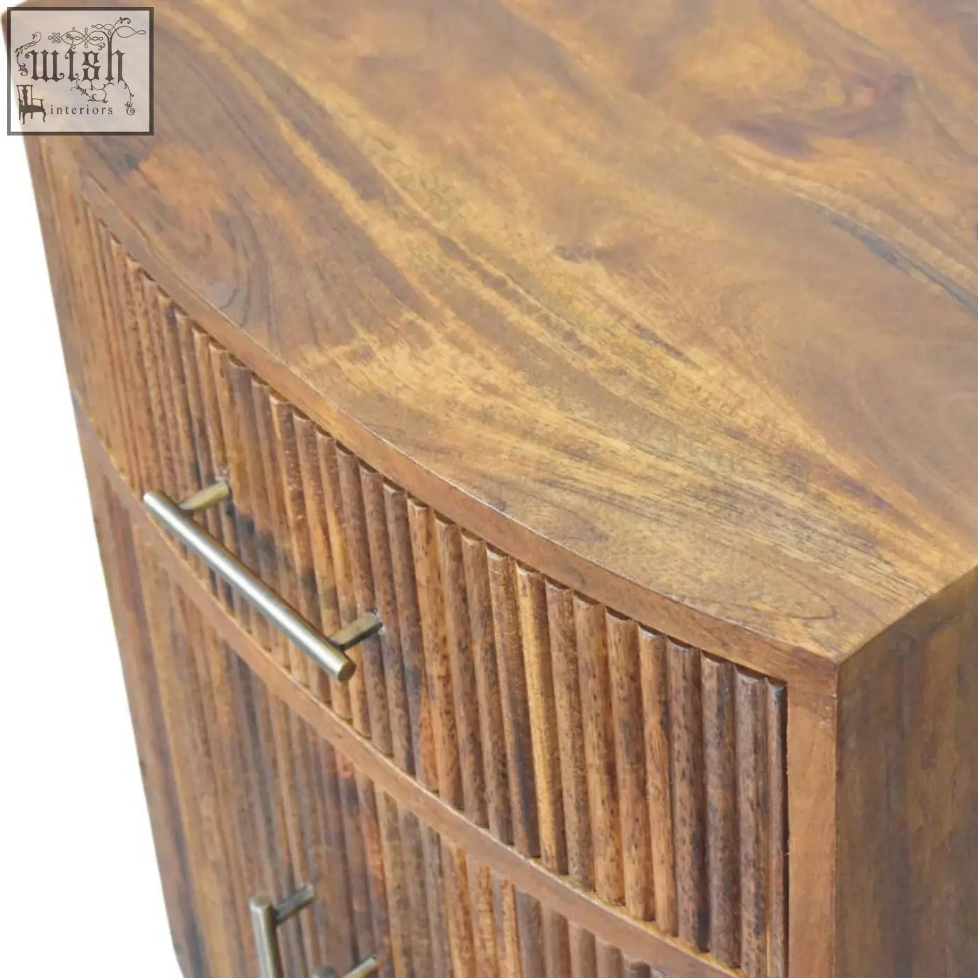 A rustic solid wood curved ribbed bedside with drawer in warm medium-brown oak solid mango wood finish
