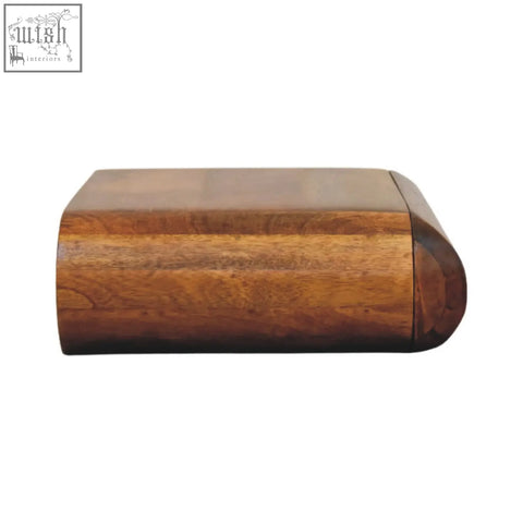 A sleek solis wall mounted bedside table in natural mango wood with a smooth polished finish and rounded edges