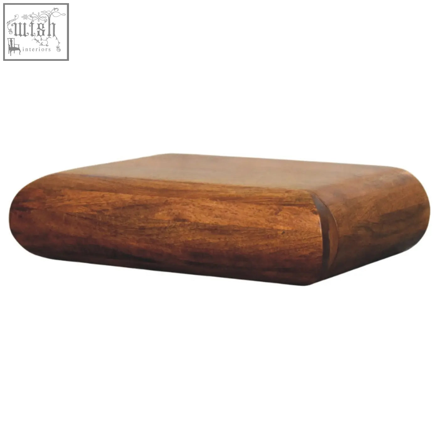 A solis wall mounted bedside table featuring a smooth rounded natural mango wood cutting board with rich brown finish
