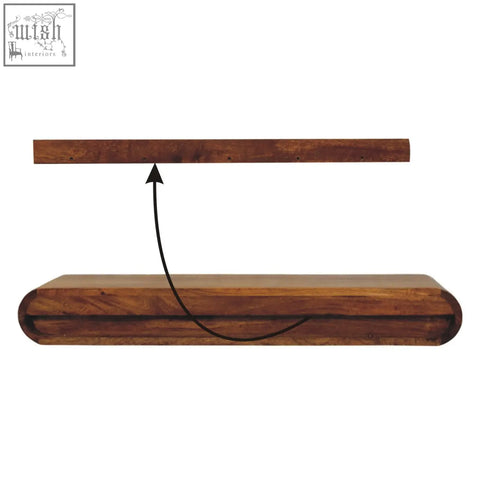 Dark brown natural mango wood floating shelf with curved lower edge and visible grain from solis console chest of drawers