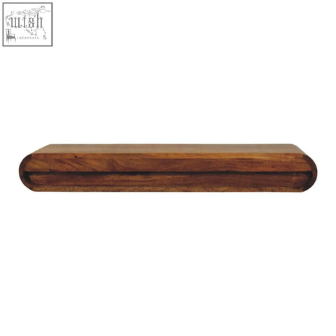 A sleek oval solis wall-mounted console chest of drawers in warm brown natural mango wood with visible grain