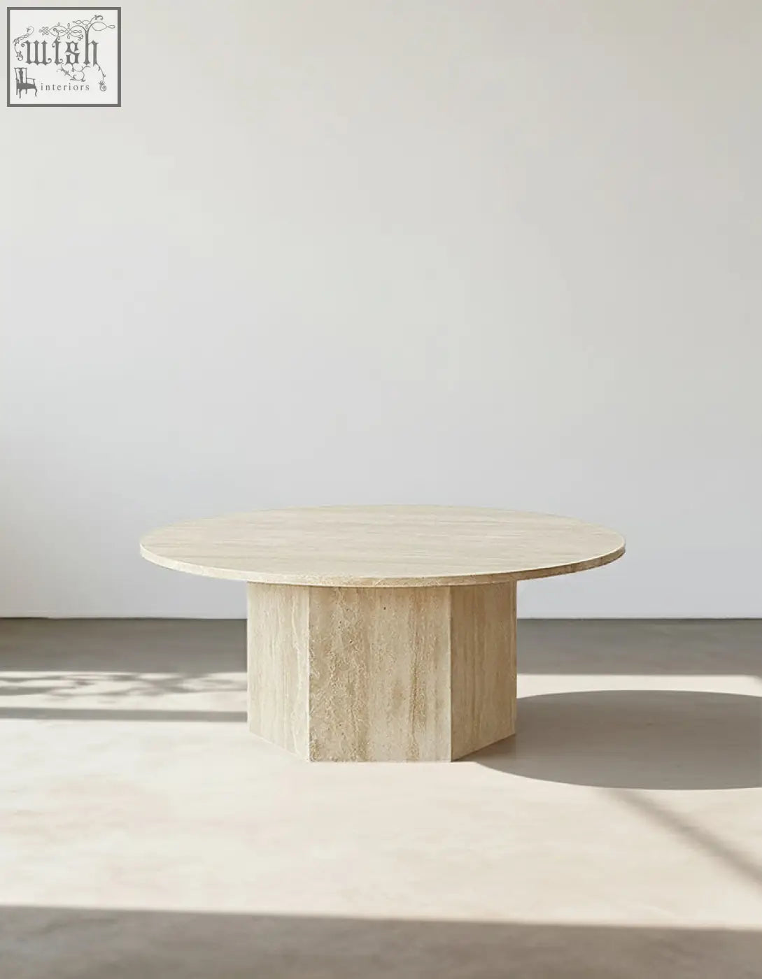 Beige stone solveig marble round coffee table with a round top and hexagonal base perfect for any living room