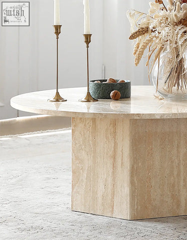 Beige stone coffee table with smooth polished surface and solid base perfect for the Solveig marble round style