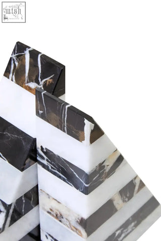 Soma set of two black and white striped marble bookends with sleek modern design for stylish shelf support