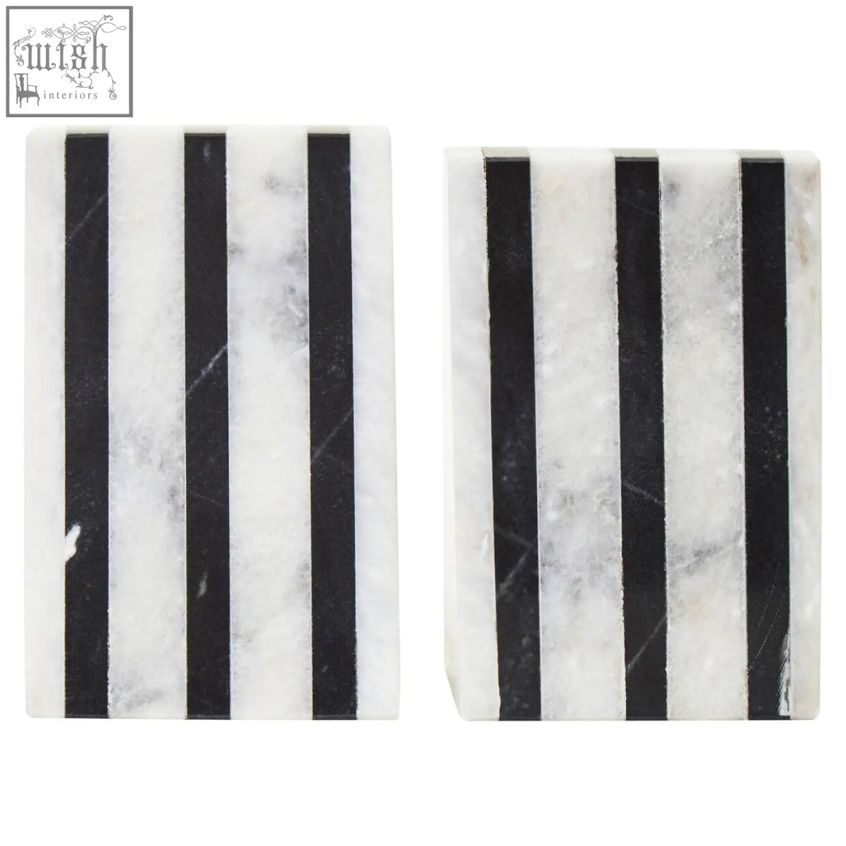 Black and white marble coasters with vertical stripes paired with white marble bookends for a stylish desk look