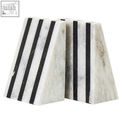 Soma set of two white marble bookends with bold black vertical stripes for stylish shelf support