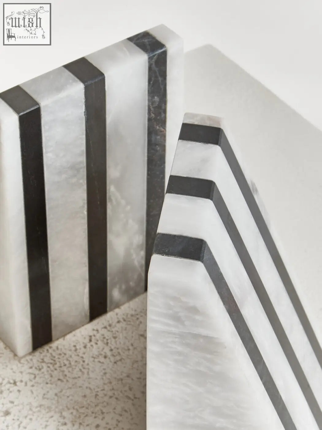 Soma set of two striped white marble bookends with sleek rectangular design and alternating white and dark gray marble bands