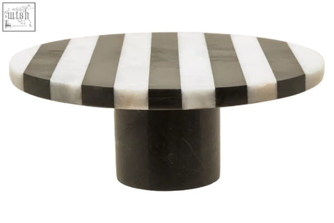 Black and white striped marble round cake stand with a cylindrical black base perfect for marble round cake display