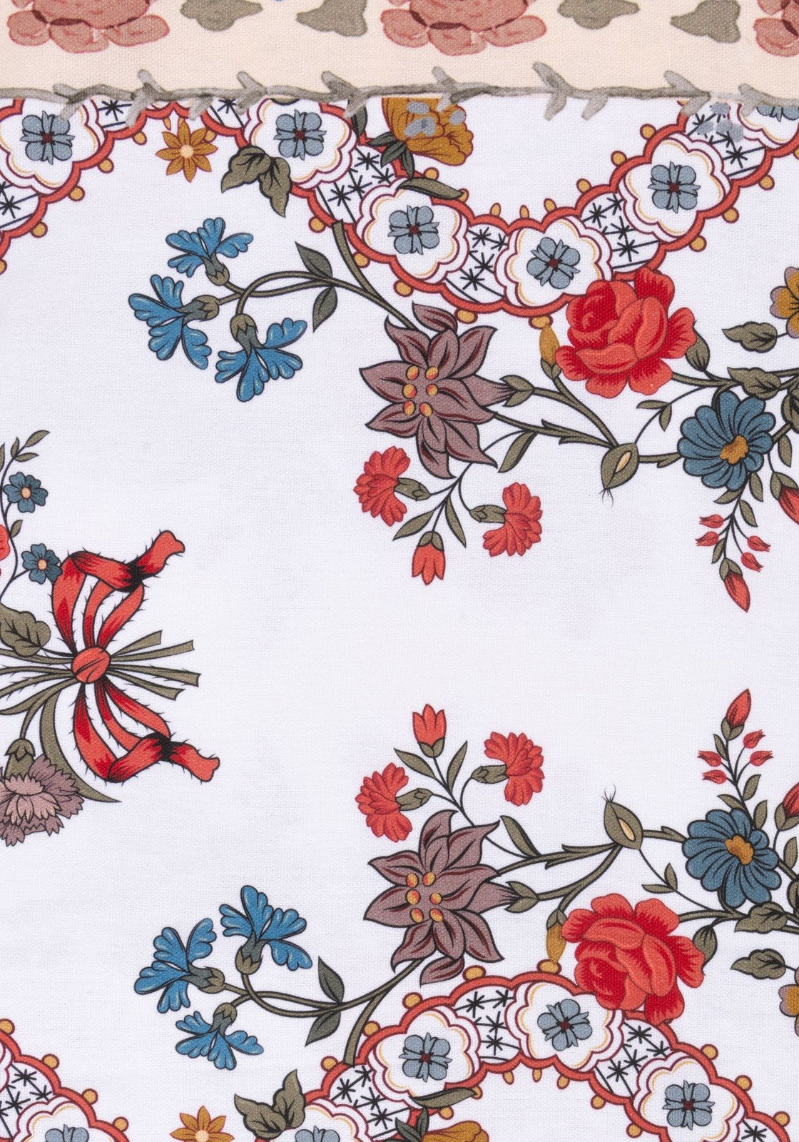 Delicate white sommerset scroll red cotton tablecloth with vibrant red blue purple floral pattern and lace borders