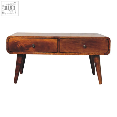 A mid-century modern sonata chestnut coffee table with warm brown wood finish and two drawers with dark metal knobs