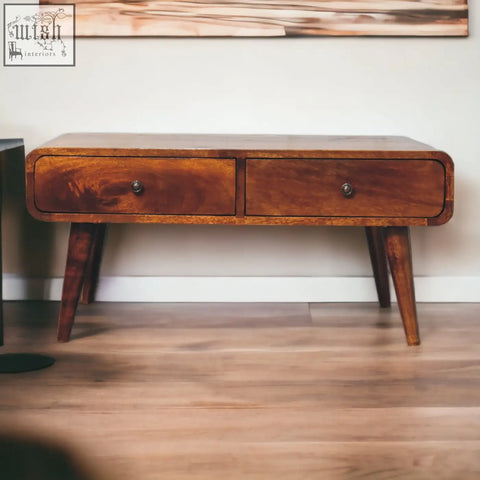 A warm medium-toned wooden sonata chestnut coffee table with two drawers and tapered legs perfect for living rooms