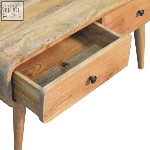 Rustic sonata oak-ish coffee table with oak-like finish rounded edges curved top and two drawers with black knobs