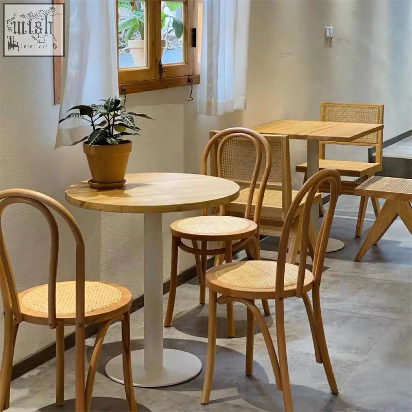 Light wood sonnet dining chair with solid wood round table white pedestal base and woven cane seat and backrest