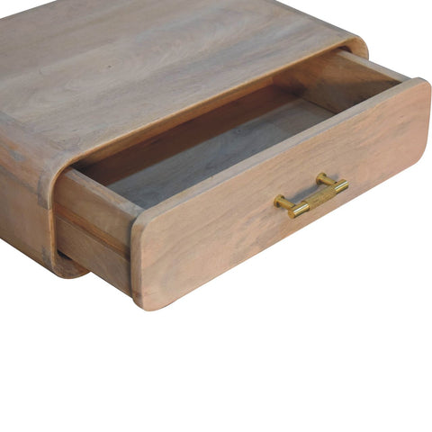 Light-colored wooden sonoma t-bar wall mounted bedside table with single drawer and gold-toned textured handles