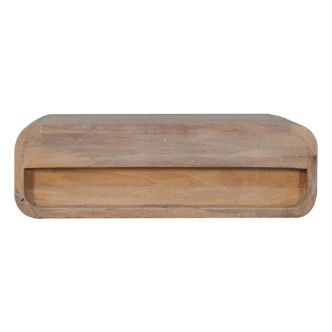 Light-colored wooden bread box with smooth curved top and front panel wall mounted for bedside use