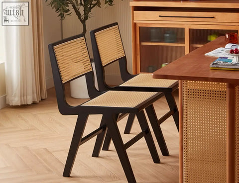 Black-framed sophia rattan dining chair with woven natural-toned seat and back perfect for dining room use