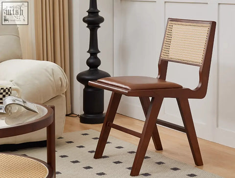 Brown wooden sophia rattan dining chair with woven cane back and brown leather seat perfect as a dining chair