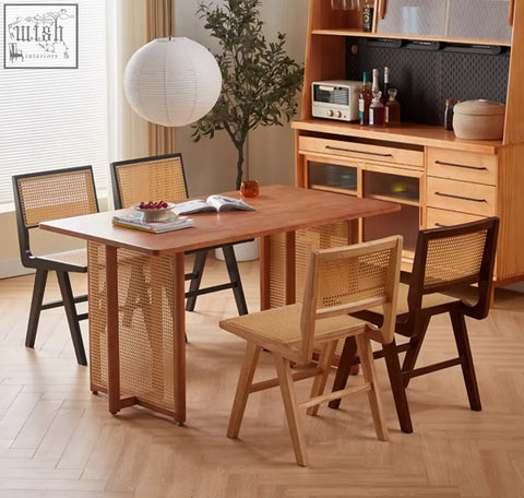 Light brown sophia rattan dining chair with cane weave sides and black metal legs for stylish dining spaces