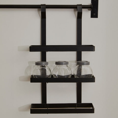 Black metal sorello matt black three level hanging rack with three tiers holding clear jars with gray lids