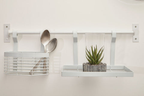 White iron single shelf by sorello white iron with wire basket for spoons and tray holding succulent pot