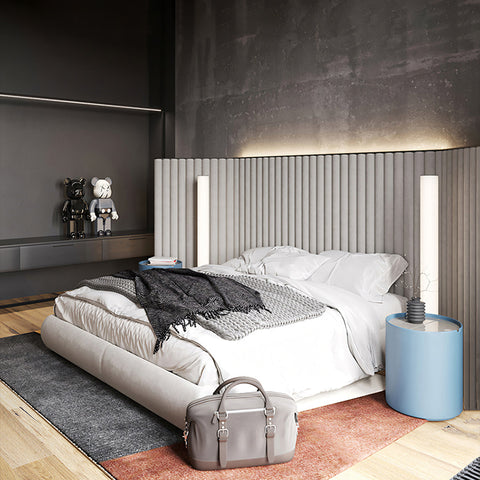 Gray leather satchel with dual top handles and silver buckles paired with soren king size bed in grey