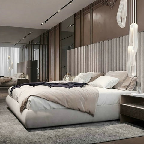 A sleek soren king size bed with a tufted beige upholstered headboard and white bedding in grey no storage design