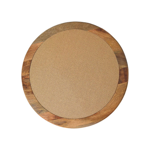 Circular wooden-framed corkboard with natural wood border and beige surface on spindle rattan coffee table