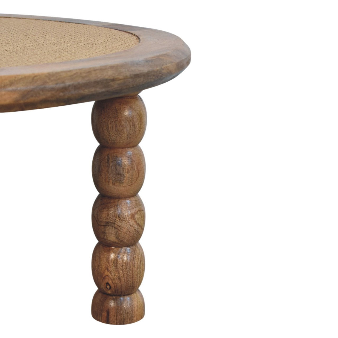 Round wooden spindle rattan coffee table with natural finish and turned ball legs perfect for living room use