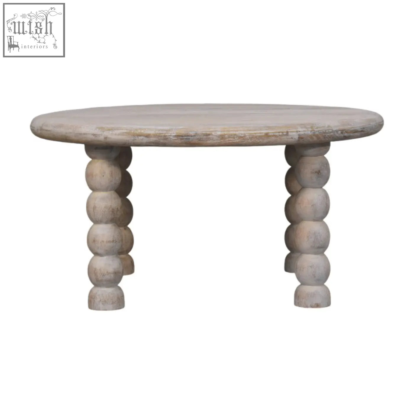 A round distressed white oak coffee table with turned bead legs in spindle salted oak solid mango wood finish