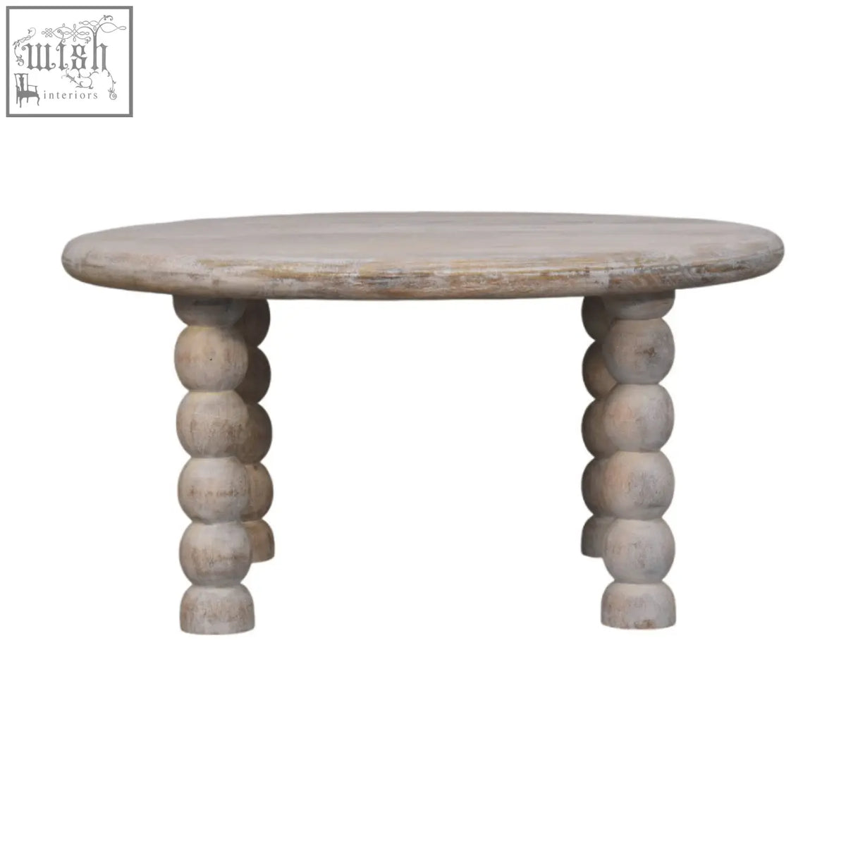 A round distressed white oak coffee table with turned bead legs in spindle salted oak solid mango wood finish