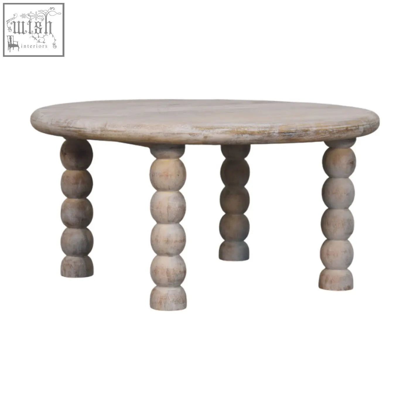 A round light-washed spindle salted oak coffee table with turned bead legs made from oak-ish solid mango wood