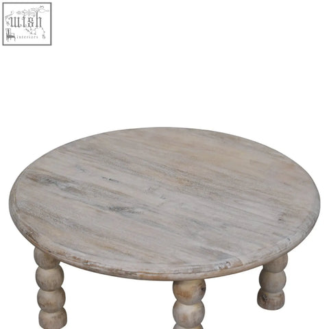 A round light gray oak coffee table with spindle salted oak turned ball legs made from solid mango wood