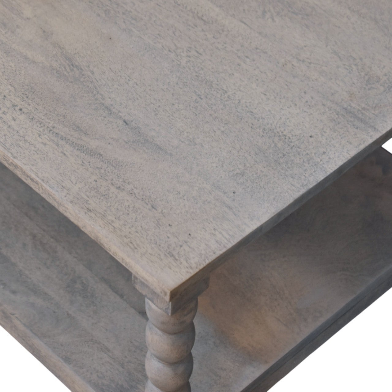 Gray distressed wood spindle washed coffee table featuring turned spindle legs and rustic finish