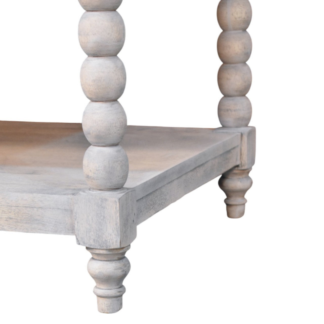 A rustic spindle washed coffee table with turned spindle legs white washed wood and natural top