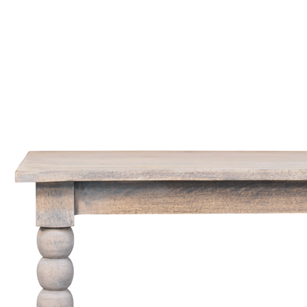 A rustic white washed wooden spindle washed coffee table with turned spindle ball legs perfect for living rooms